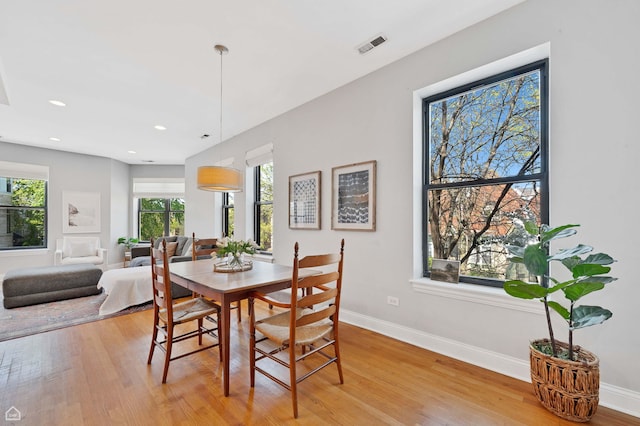 4606 S Lake Park Ave Unit 201N, Chicago, IL 60653 - dining space featuring light wood finished floors, baseboards, and recessed lighting