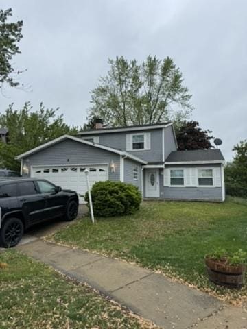 8 Lasalle Ct, Streamwood, IL 60107 - view of front of property with a garage, a front lawn, driveway, and a chimney