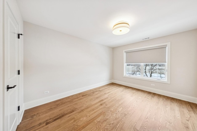 6202 Flagg Creek Ln, Western Springs, IL 60558 - spare room with baseboards and light wood finished floors