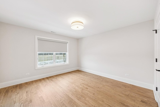 6202 Flagg Creek Ln, Western Springs, IL 60558 - unfurnished room featuring light wood-type flooring and baseboards