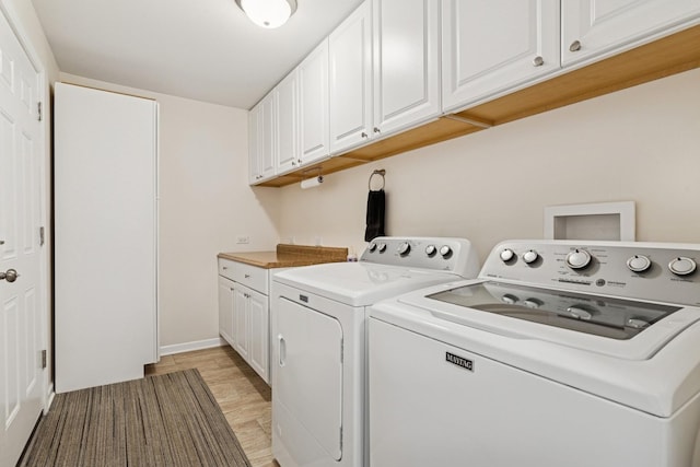 512 N Rose Ave, Park Ridge, IL 60068 - laundry area with separate washer and dryer, cabinet space, and baseboards