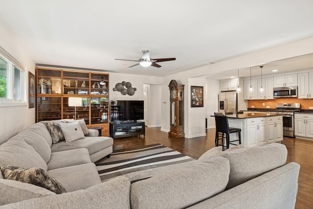 512 N Rose Ave, Park Ridge, IL 60068 - living room featuring a ceiling fan, dark wood-style floors, and baseboards
