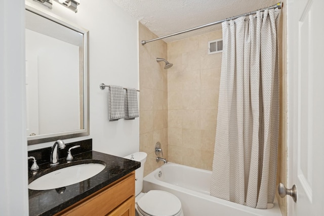 450 W Briar Pl Unit 3K, Chicago, IL 60657 - bathroom with toilet, shower / tub combo, vanity, and a textured ceiling