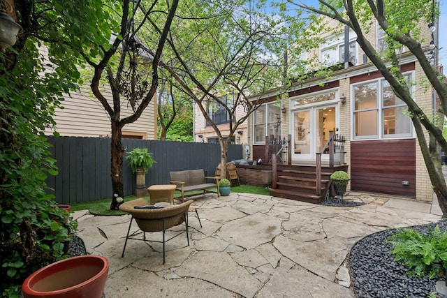 view of patio / terrace featuring a sunroom