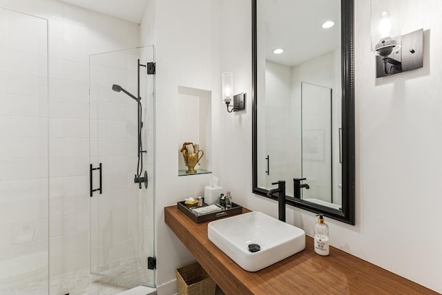 full bath with a stall shower and recessed lighting