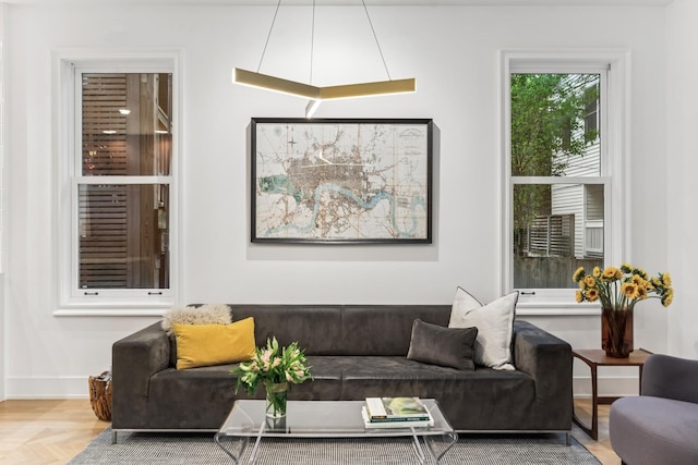 living room featuring baseboards
