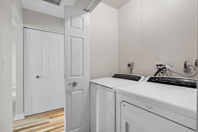 400 Bayview Ave, Naperville, IL 60565 - laundry room with separate washer and dryer and light wood finished floors