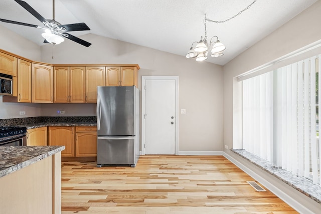 400 Bayview Ave, Naperville, IL 60565 - kitchen featuring stainless steel appliances, ceiling fan, lofted ceiling, light wood-style floors, and dark countertops