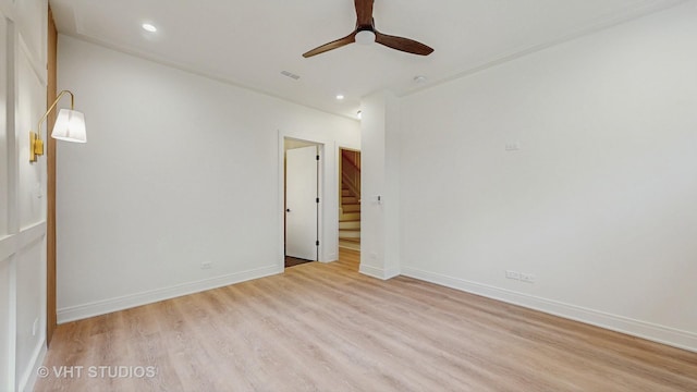 642 W Webster Ave Unit 1, Chicago, IL 60614 - unfurnished room featuring a ceiling fan, light wood finished floors, stairs, crown molding, and recessed lighting