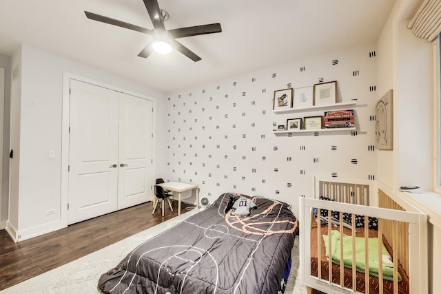 2312 W Belmont Ave Unit 1W, Chicago, IL 60618 - bedroom featuring wood finished floors, a closet, and ceiling fan