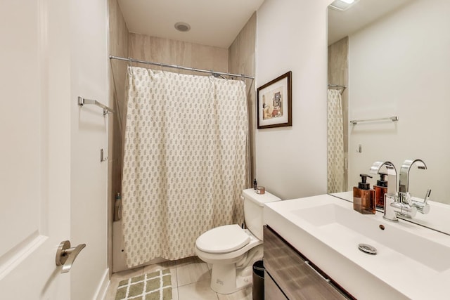 2312 W Belmont Ave Unit 1W, Chicago, IL 60618 - bathroom with toilet, vanity, tile patterned floors, and a shower with shower curtain