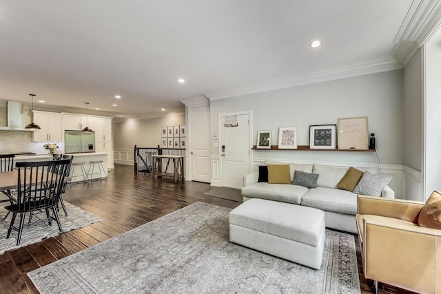 2312 W Belmont Ave Unit 1W, Chicago, IL 60618 - living area featuring ornamental molding, a wainscoted wall, dark wood finished floors, a decorative wall, and recessed lighting