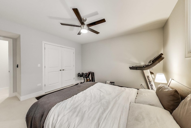 2312 W Belmont Ave Unit 1W, Chicago, IL 60618 - carpeted bedroom featuring a ceiling fan and a closet