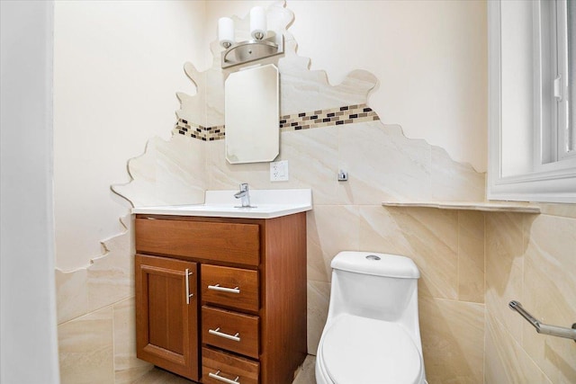 703 Berkshire Ln, Schaumburg, IL 60193 - half bath featuring tile walls, vanity, and toilet
