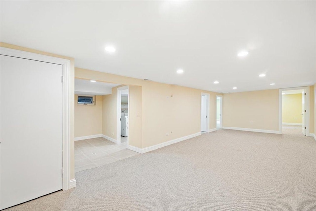 703 Berkshire Ln, Schaumburg, IL 60193 - finished basement with recessed lighting, baseboards, light colored carpet, and washer / clothes dryer
