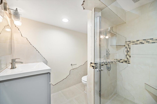 703 Berkshire Ln, Schaumburg, IL 60193 - full bath with vanity, a stall shower, tile walls, toilet, and recessed lighting