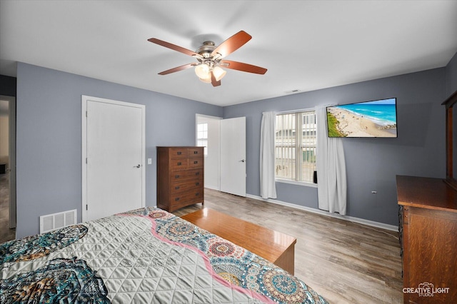 1840 Venson Ln Unit 1840, Joliet, IL 60435 - bedroom featuring wood finished floors, baseboards, and ceiling fan