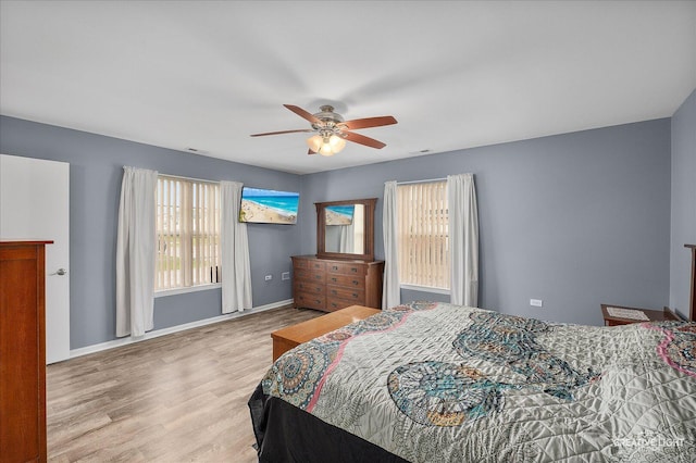 1840 Venson Ln Unit 1840, Joliet, IL 60435 - bedroom featuring wood finished floors, ceiling fan, and baseboards