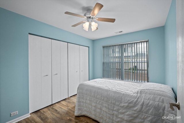 1840 Venson Ln Unit 1840, Joliet, IL 60435 - bedroom with wood finished floors, a closet, ceiling fan, and baseboards