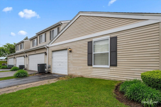 1840 Venson Ln Unit 1840, Joliet, IL 60435 - view of front of home with central AC, driveway, and a front yard