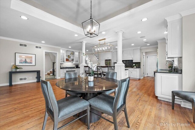 3 Woodley Mnr, Winnetka, IL 60093 - dining room featuring decorative columns, stairs, recessed lighting, ornamental molding, and a chandelier