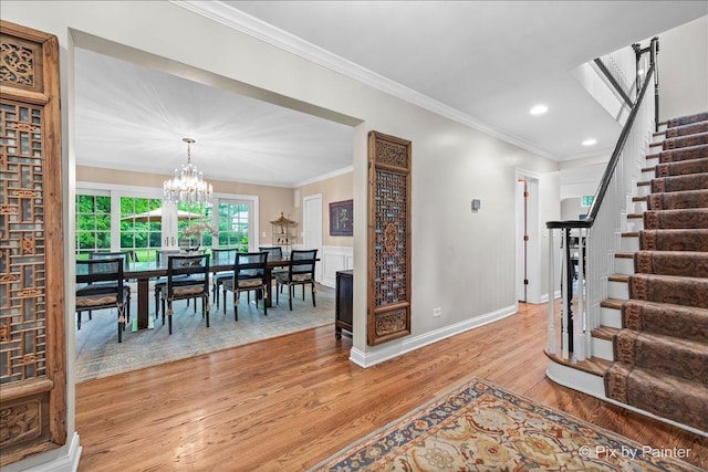 3 Woodley Mnr, Winnetka, IL 60093 - foyer entrance with stairway, light wood-type flooring, ornamental molding, a chandelier, and recessed lighting