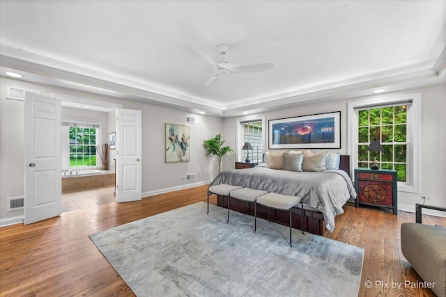 3 Woodley Mnr, Winnetka, IL 60093 - bedroom with a raised ceiling, baseboards, multiple windows, and recessed lighting