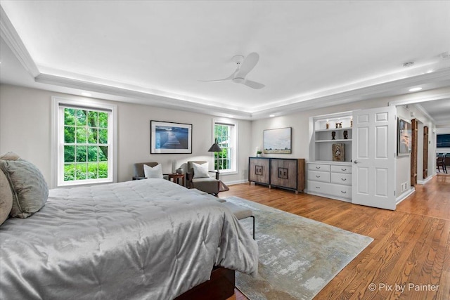 3 Woodley Mnr, Winnetka, IL 60093 - bedroom featuring a tray ceiling, wood finished floors, recessed lighting, and a ceiling fan