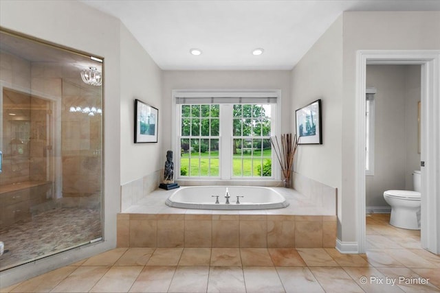 3 Woodley Mnr, Winnetka, IL 60093 - full bath featuring a garden tub, toilet, tile patterned flooring, and a shower stall