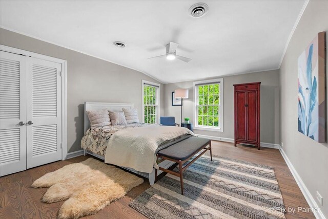 3 Woodley Mnr, Winnetka, IL 60093 - bedroom with baseboards, a closet, wood finished floors, lofted ceiling, and a ceiling fan