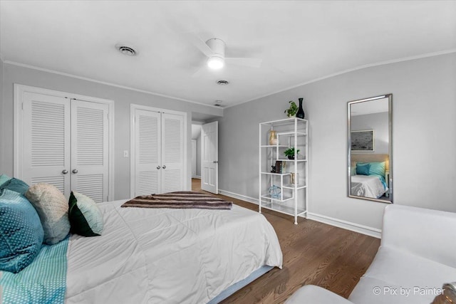 3 Woodley Mnr, Winnetka, IL 60093 - bedroom with multiple closets, wood finished floors, crown molding, baseboards, and ceiling fan
