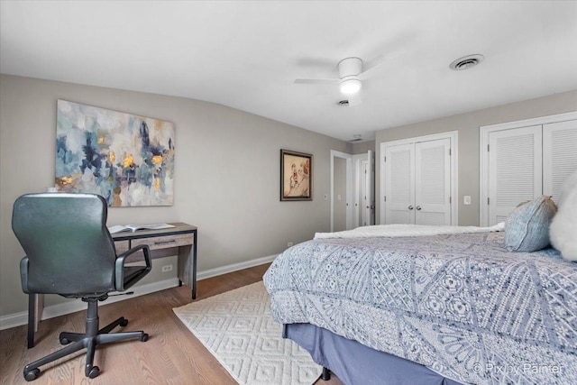 3 Woodley Mnr, Winnetka, IL 60093 - bedroom featuring two closets, wood finished floors, baseboards, and a ceiling fan