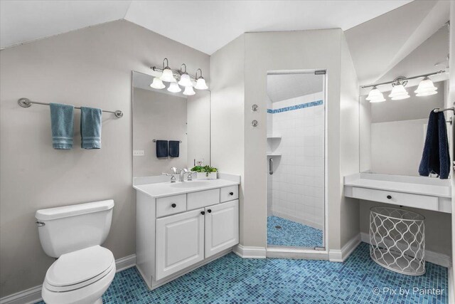 3 Woodley Mnr, Winnetka, IL 60093 - bathroom featuring vanity, a shower stall, vaulted ceiling, toilet, and tile patterned flooring