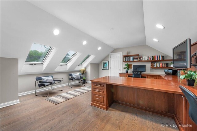 3 Woodley Mnr, Winnetka, IL 60093 - home office featuring light wood-type flooring, a skylight, recessed lighting, vaulted ceiling, and baseboards