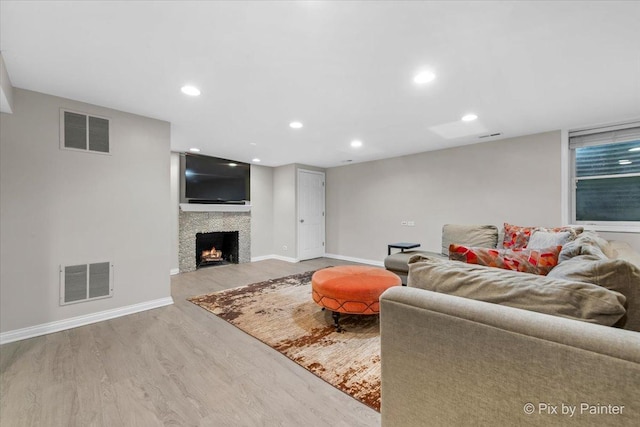 3 Woodley Mnr, Winnetka, IL 60093 - living room featuring wood finished floors, baseboards, a lit fireplace, and recessed lighting