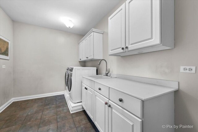 3 Woodley Mnr, Winnetka, IL 60093 - washroom featuring cabinet space, baseboards, washing machine and clothes dryer, and stone finish flooring