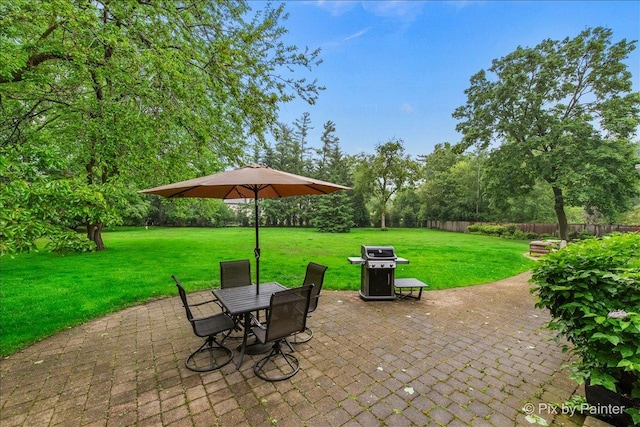 3 Woodley Mnr, Winnetka, IL 60093 - view of patio / terrace featuring a grill, outdoor dining space, and view of wooded area