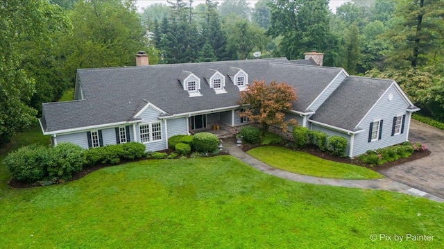 3 Woodley Mnr, Winnetka, IL 60093 - cape cod house featuring a chimney and a front yard