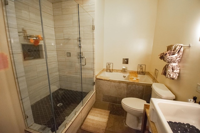 1727 S Indiana Ave Unit 214, Chicago, IL 60616 - bathroom with a garden tub, a shower stall, and tile patterned flooring