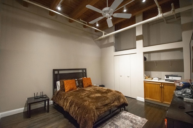 1727 S Indiana Ave Unit 214, Chicago, IL 60616 - bedroom featuring rail lighting, dark wood finished floors, a high ceiling, and a wood ceiling with exposed beams