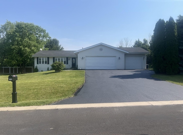 120 Harvest Glenn Dr, Davis Junction, IL 61020 - single story home featuring a front lawn, driveway, and a garage