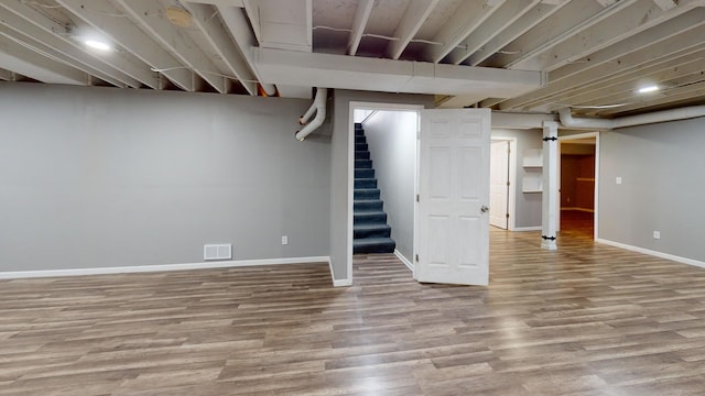 120 Harvest Glenn Dr, Davis Junction, IL 61020 - finished basement with wood finished floors and stairway