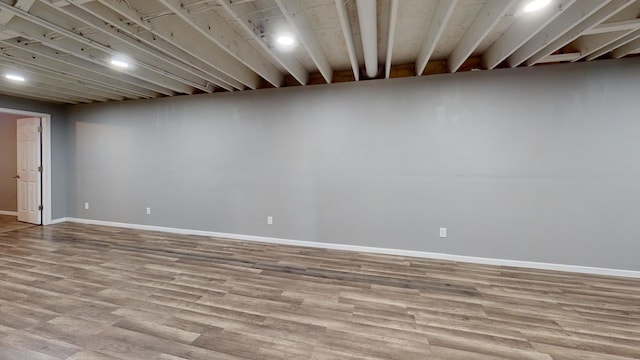 120 Harvest Glenn Dr, Davis Junction, IL 61020 - finished basement with baseboards and wood finished floors
