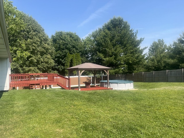 120 Harvest Glenn Dr, Davis Junction, IL 61020 - view of yard with a gazebo and a wooden deck
