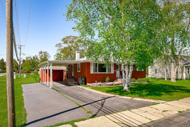 1410 Barnhart Ct, Zion, IL 60099 - view of front of home featuring an attached carport, a front yard, and driveway