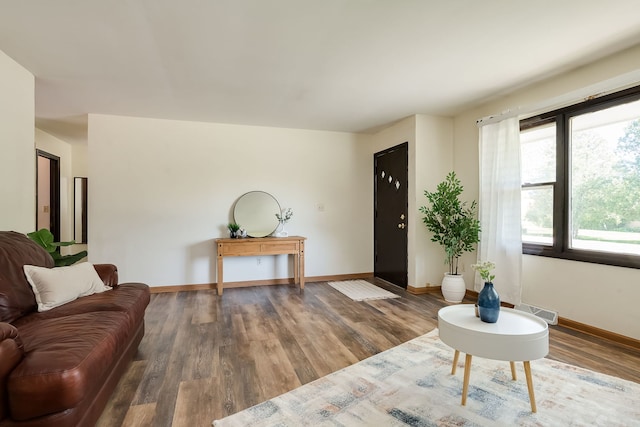 1410 Barnhart Ct, Zion, IL 60099 - living room featuring wood finished floors and baseboards