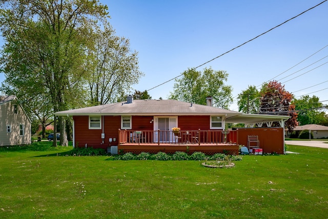 1410 Barnhart Ct, Zion, IL 60099 - rear view of property with a yard and a deck