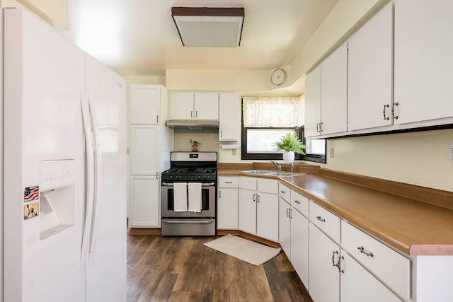 1410 Barnhart Ct, Zion, IL 60099 - kitchen with white refrigerator with ice dispenser, stainless steel range with gas cooktop, a sink, under cabinet range hood, and white cabinetry