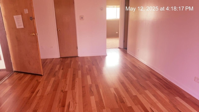 3145 Bernice Rd Unit 4, Lansing, IL 60438 - empty room featuring wood finished floors and baseboards