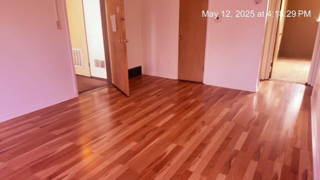 3145 Bernice Rd Unit 4, Lansing, IL 60438 - empty room featuring wood finished floors